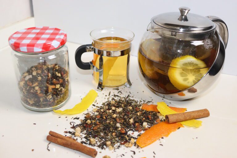 Brewing tea with zests and cinnammon sticks