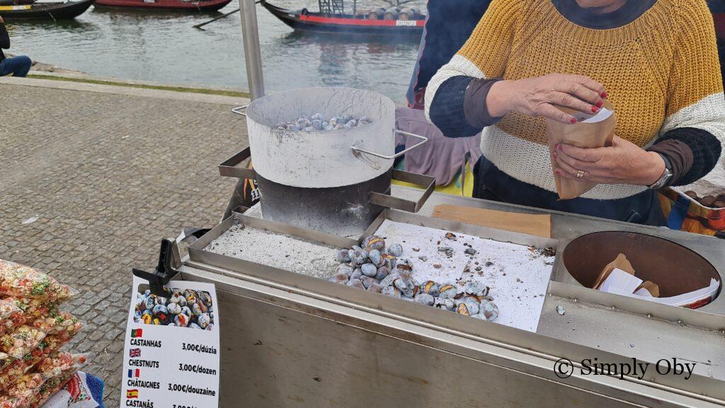 Street vendor selling roasted chestnuts