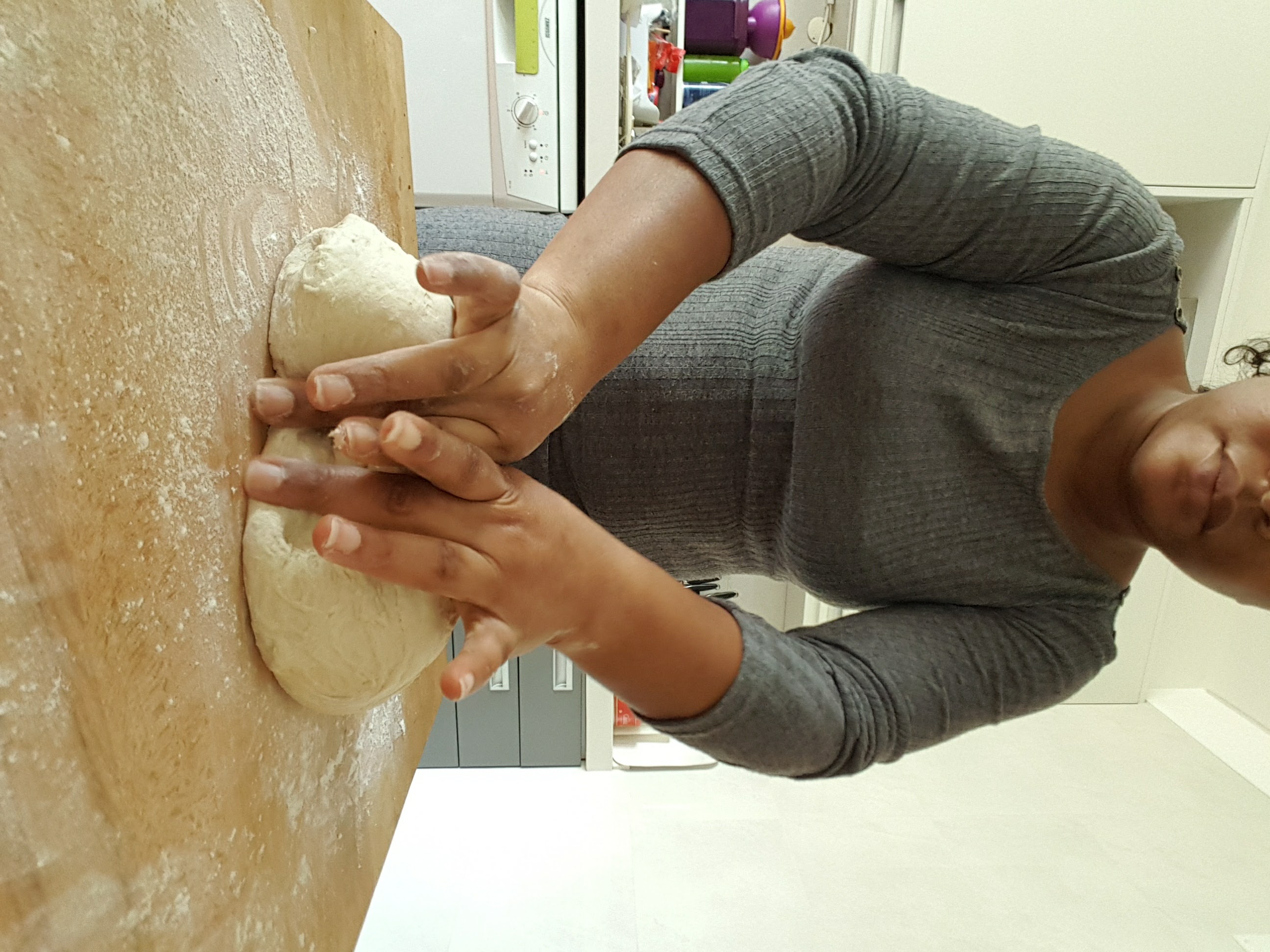 Oby kneading a dough