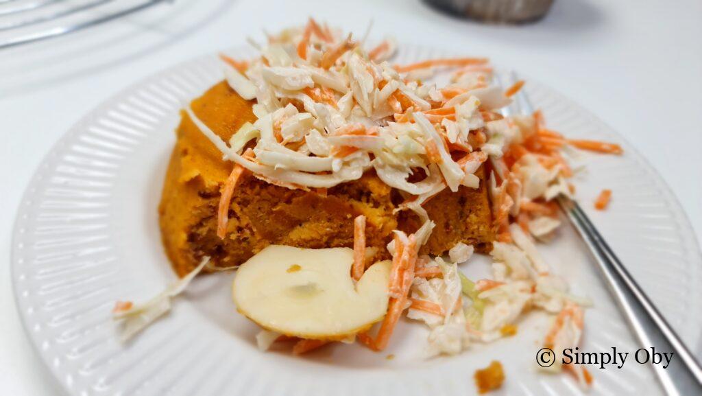 Plate of moimoi with coleslaw